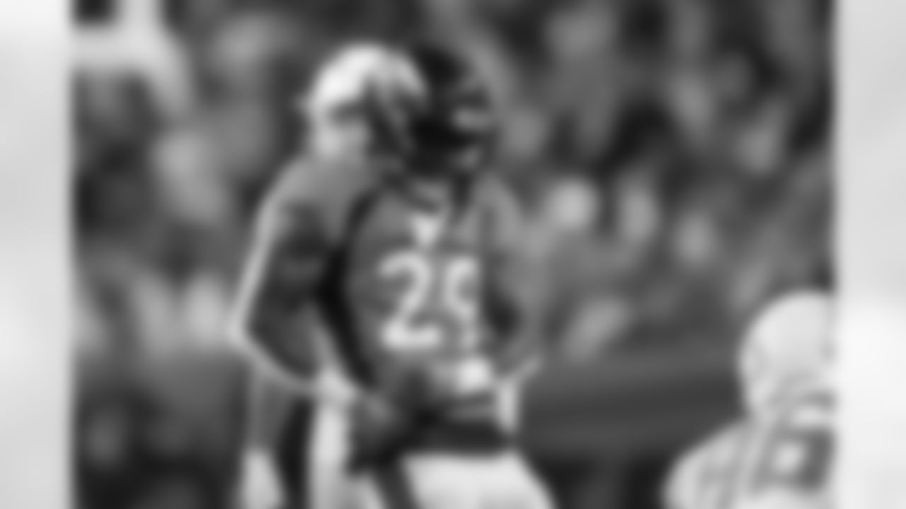 Denver Broncos cornerback Ja'Quan McMillian (29) celebrates after a pass breakup during the Broncos' Week 17 game against the Los Angeles Chargers at Empower Field at Mile High in Denver, Colorado on December 31, 2023. Photo by Ben Swanson / Denver Broncos