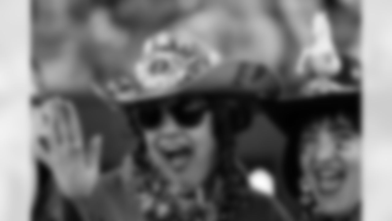 Fans with custom hats before the Broncos' Week 15 game against the Green Bay Packers at Empower Field at Mile High in Denver, Colorado on December 14, 2025. Photo by Ben Swanson / Denver Broncos