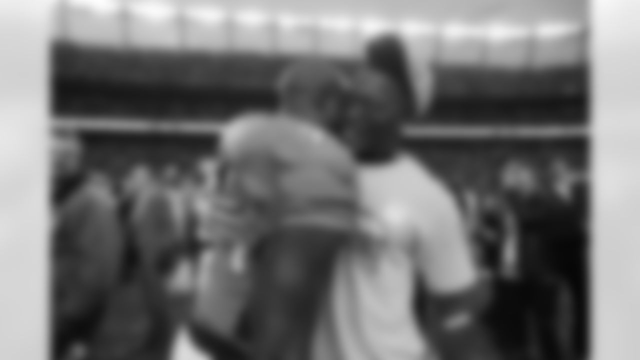 DeMarcus Ware celebrates with Demaryius Thomas after defeating the New England Patriots in the AFC Championship at Sports Authority Field at Mile High in Denver on January 24, 2016.
Photo by Gabriel Christus