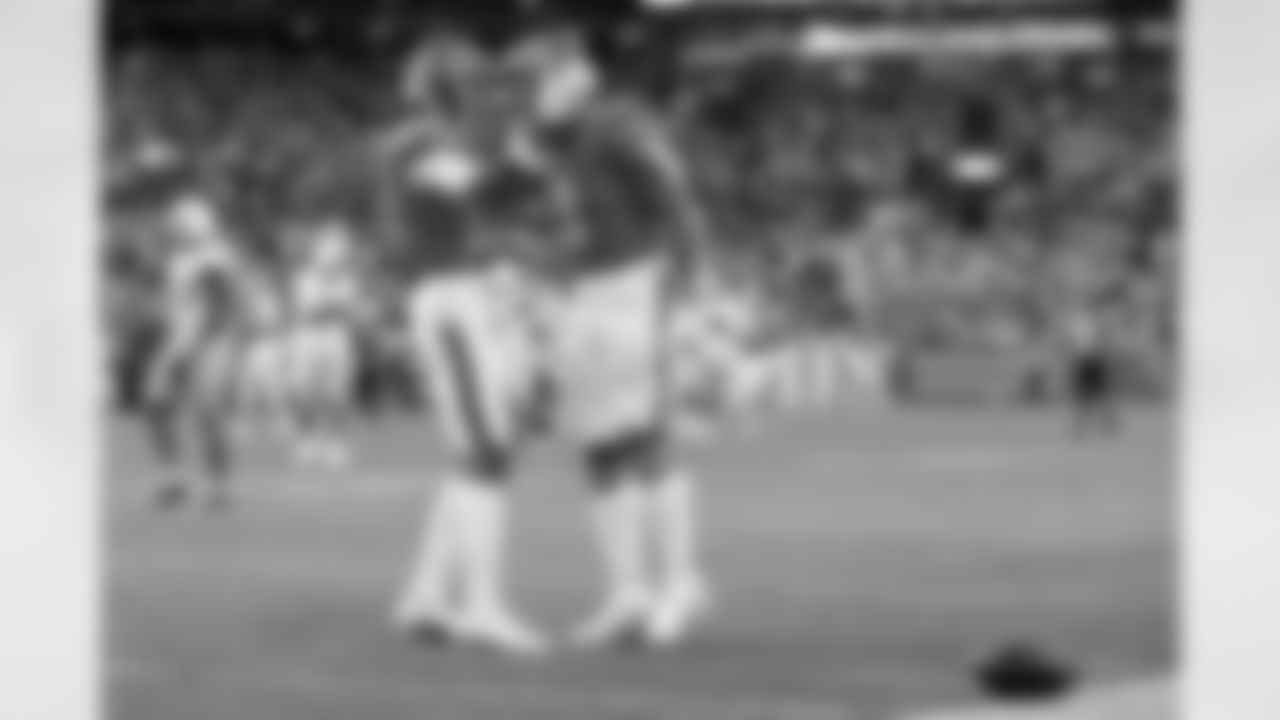 Denver Broncos wide receiver Troy Franklin (11) celebrates a big catch-and-run by tight end Evan Engram (1) during the Broncos' Week 18 game against the Los Angeles Chargers at Empower Field at Mile High in Denver, Colorado on January 4, 2026. Photo by Gavin Liddell / Denver Broncos