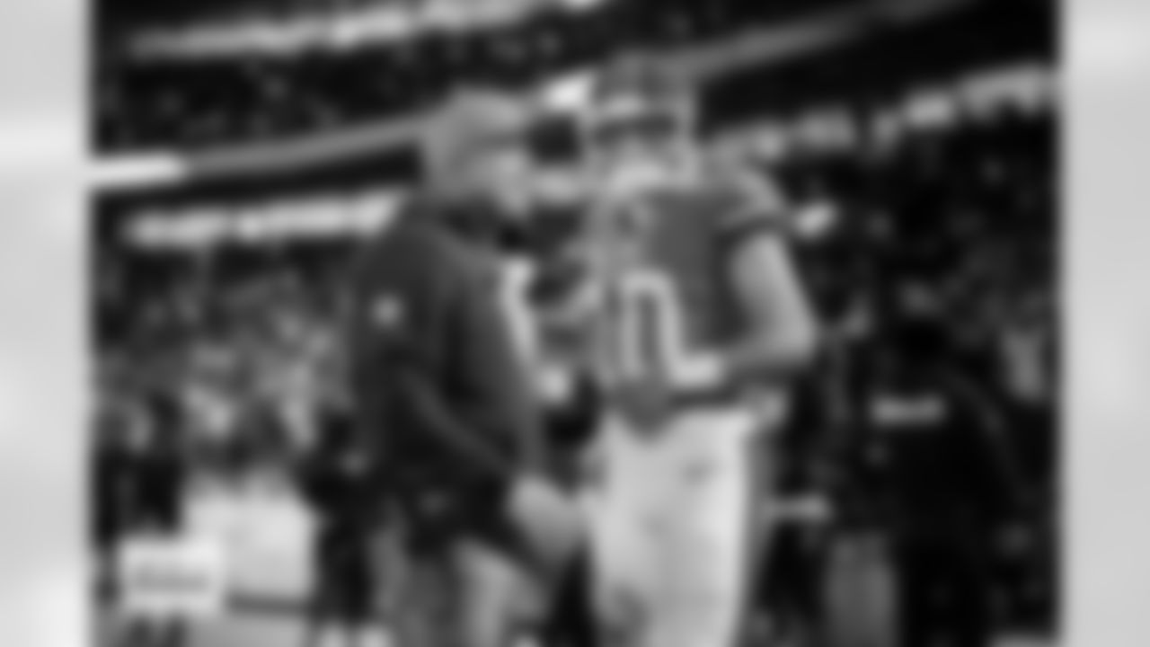 Denver Broncos head coach Sean Payton and quarterback Bo Nix (10) share a laugh before the Broncos' Week 10 game against the Las Vegas Raiders at Empower Field at Mile High in Denver, Colorado on November 6, 2025. Photo by Ben Swanson / Denver Broncos