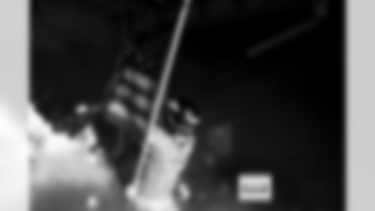 Denver Broncos wide receiver Marvin Mims Jr. (19) runs with an American flag in the tunnel for team introductions before the Broncos' Week 11 game against the Kansas City Chiefs at Empower Field at Mile High in Denver, Colorado on November 16, 2025. Photo by Gabriel Christus / Denver Broncos