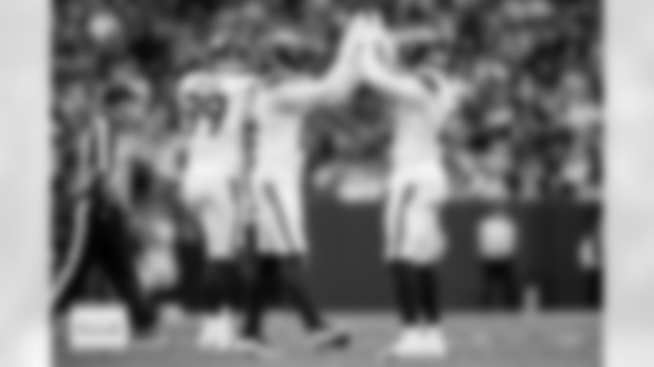 Denver Broncos linebacker Nik Bonitto (15) celebrates a sack with linebacker Jonathon Cooper (0) during the Broncos' Week 14 game against the Las Vegas Raiders at Allegiant Stadium in Las Vegas, Nevada on December 7, 2025. Photo by Gabriel Christus / Denver Broncos