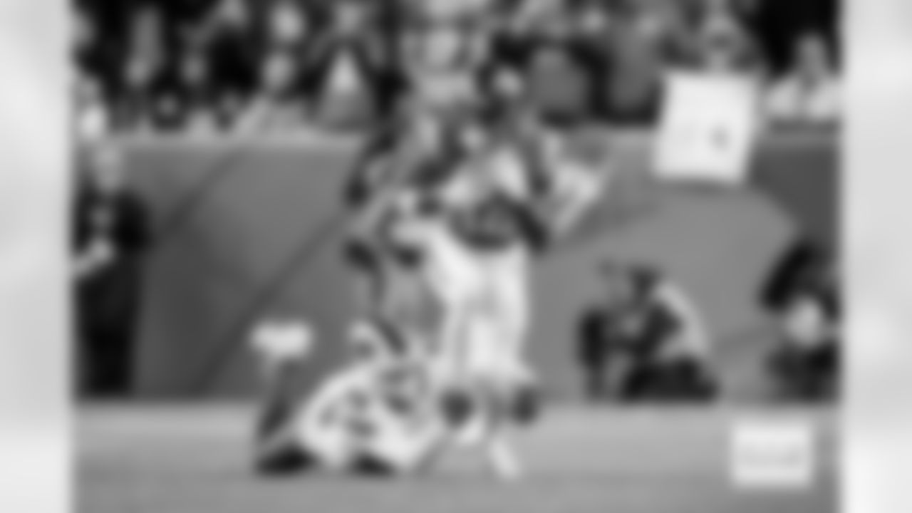 Denver Broncos wide receiver Courtland Sutton (14) runs with the ball on a reception during the Broncos' Divisional Round playoff game against the Buffalo Bills at Empower Field at Mile High in Denver, Colorado on January 17, 2026. Photo by Gavin Liddell / Denver Broncos