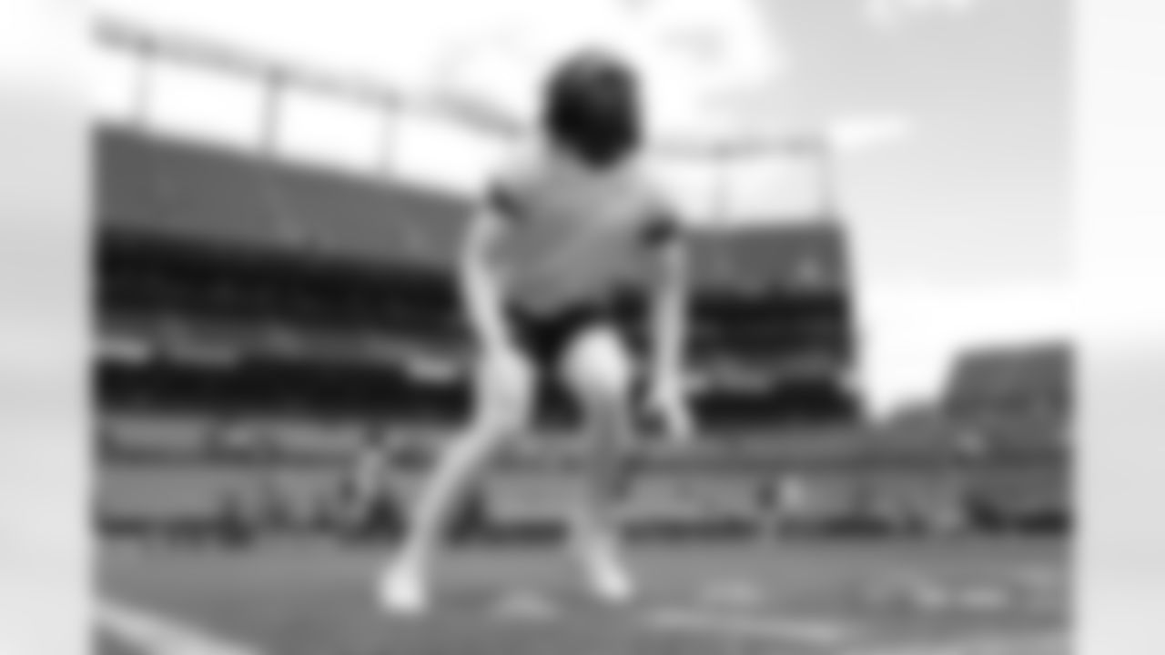 Players warm up during the Broncos' preseason Week 2 game against the Green Bay Packers at Empower Field at Mile High in Denver, Colorado on August 18, 2024. (Photo by Ben Swanson/Denver Broncos)