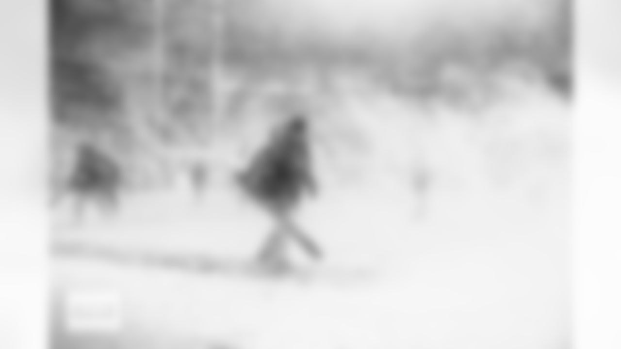 Workers use leafblowers to clear the snow from the ffield during the AFC Championship Game between the Denver Broncos and New England Patriots at Empower Field at Mile High in Denver, Colorado on January 25, 2026. Photo by Gabriel Christus / Denver Broncos