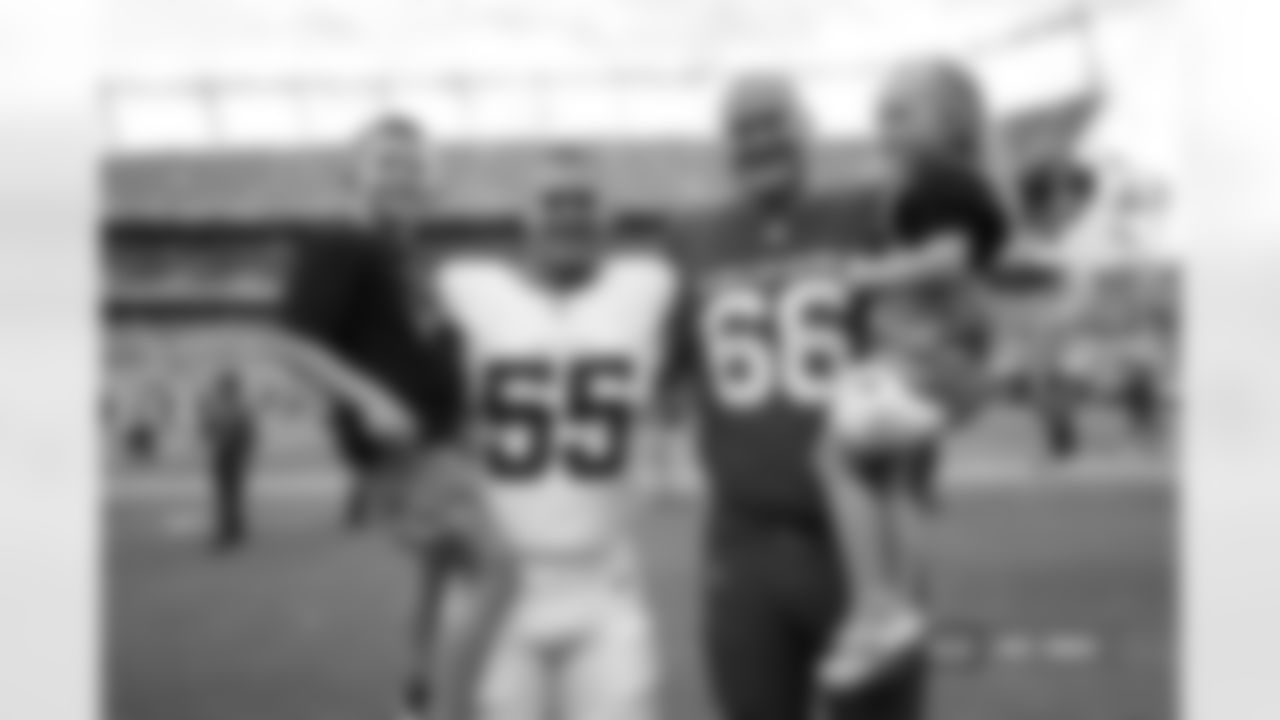 Cody Barton #55 of the Denver Broncos and Jackson Barton #66 of the Arizona Cardinals pose for a photo after the Broncos' Preseason Week 3 game against the Arizona Cardinals at Empower Field At Mile High on August 25, 2024 in Denver, Colorado. (Photo by Ben Swanson/Denver Broncos)