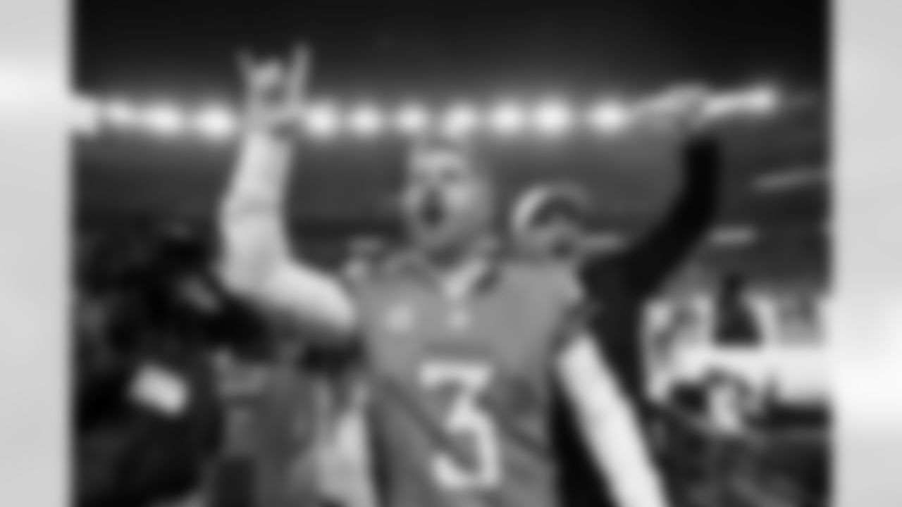 Denver Broncos placekicker Wil Lutz (3) celebrates with Darren Rizzi after the Broncos' Divisional Round playoff game against the Buffalo Bills at Empower Field at Mile High in Denver, Colorado on January 17, 2026. Photo by Ben Swanson / Denver Broncos