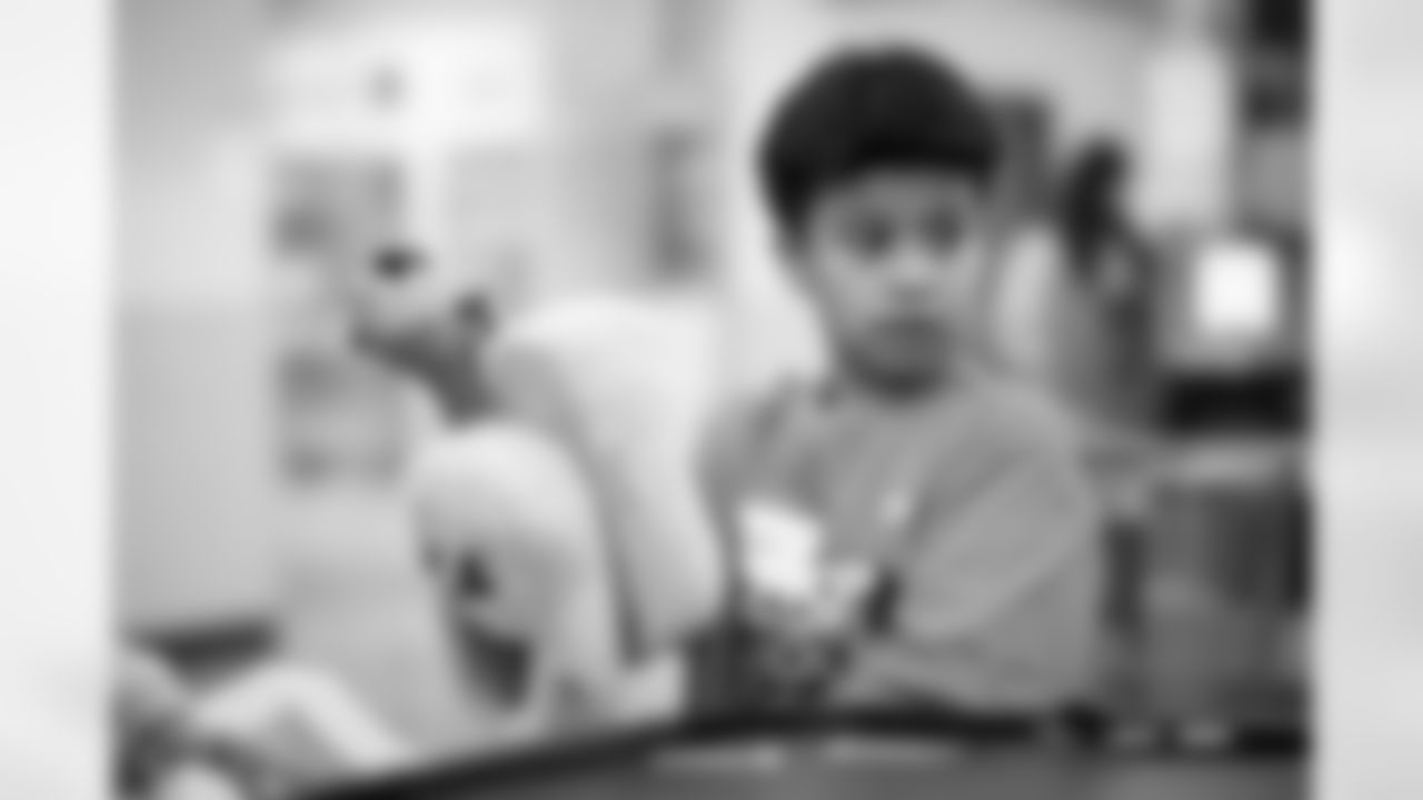 Children from the Boys & Girls Club participate in a Shop with a Jock shopping spree with Broncos players, alumni and cheerleader alumni in Aurora, Colorado on December 15, 2025. Photo by Ben Swanson / Denver Broncos