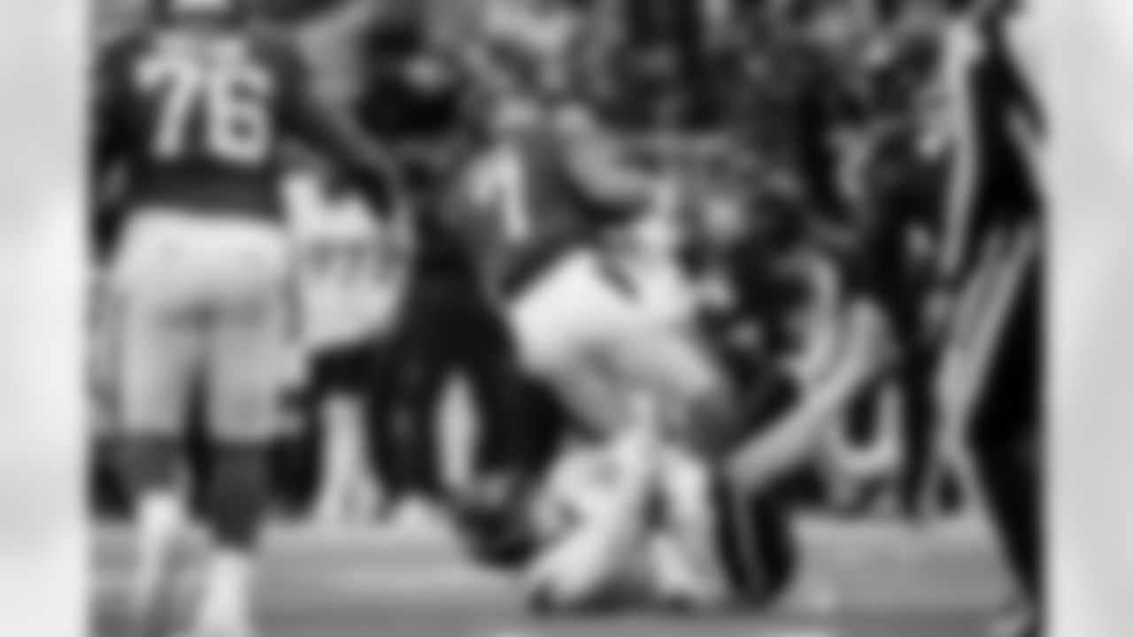 Nik Bonitto sacks Justin Fields during the Broncos' Week 6 game against the New York Jets at Tottenham Hotspur Stadium in London, England on October 12, 2025. Photo by Ben Swanson / Denver Broncos