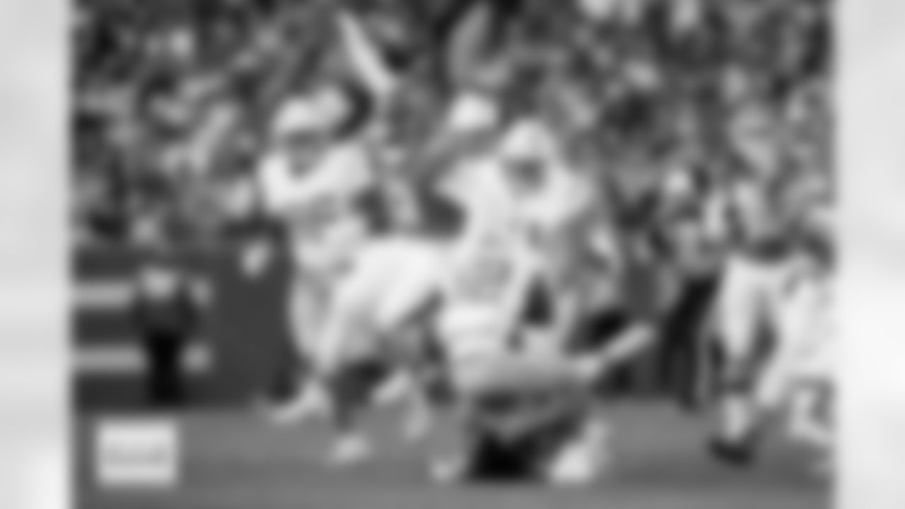 D.J. Jones and Talanoa Hufanga during the Broncos' Week 18 game against the Los Angeles Chargers at Empower Field at Mile High in Denver, Colorado on January 4, 2026. Photo by Gavin Liddell / Denver Broncos