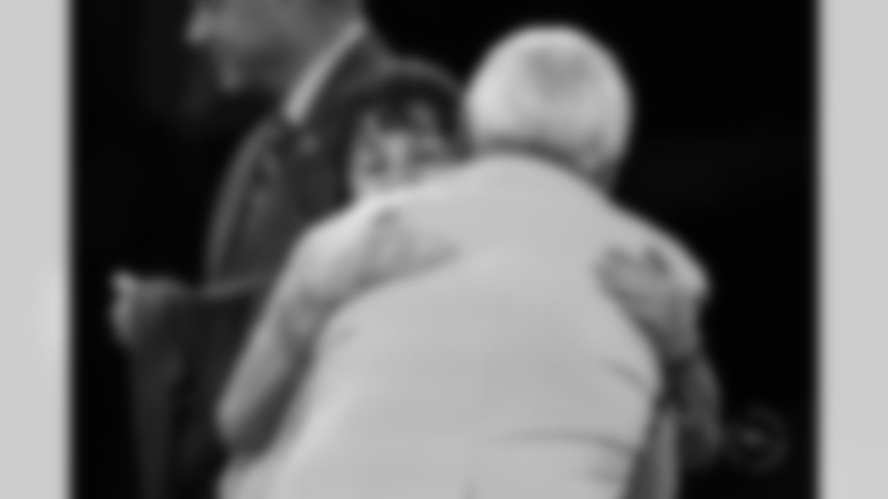 Randy Gradishar hugs his wife during the Pro Football Hall of Fame's 2024 gold jacket ceremony in Canton, Ohio on August 2, 2024. Photo by Ben Swanson / Denver Broncos