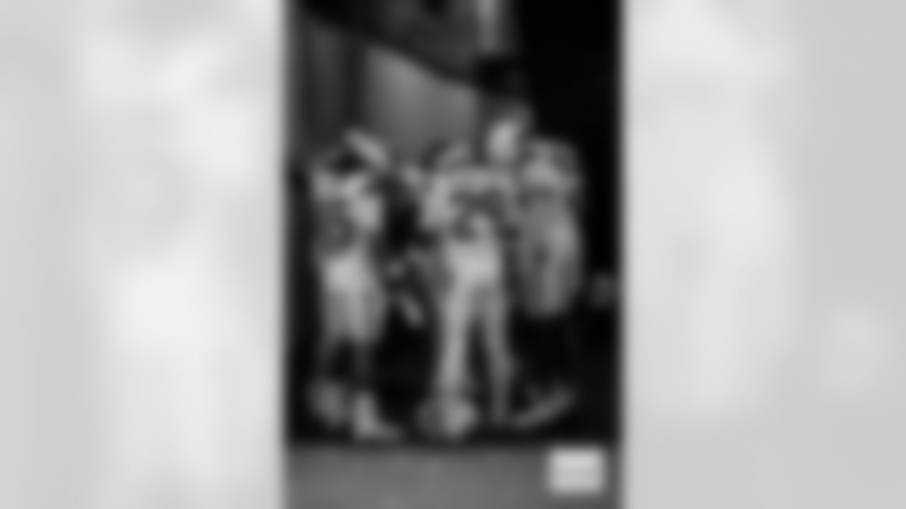 The defensive backs huddle in prayer before the Broncos' Week 17 game against the Kansas City Chiefs at GEHA Field at Arrowhead Stadium in Kansas City, Missouri on December 25, 2025. Photo by Ben Swanson / Denver Broncos