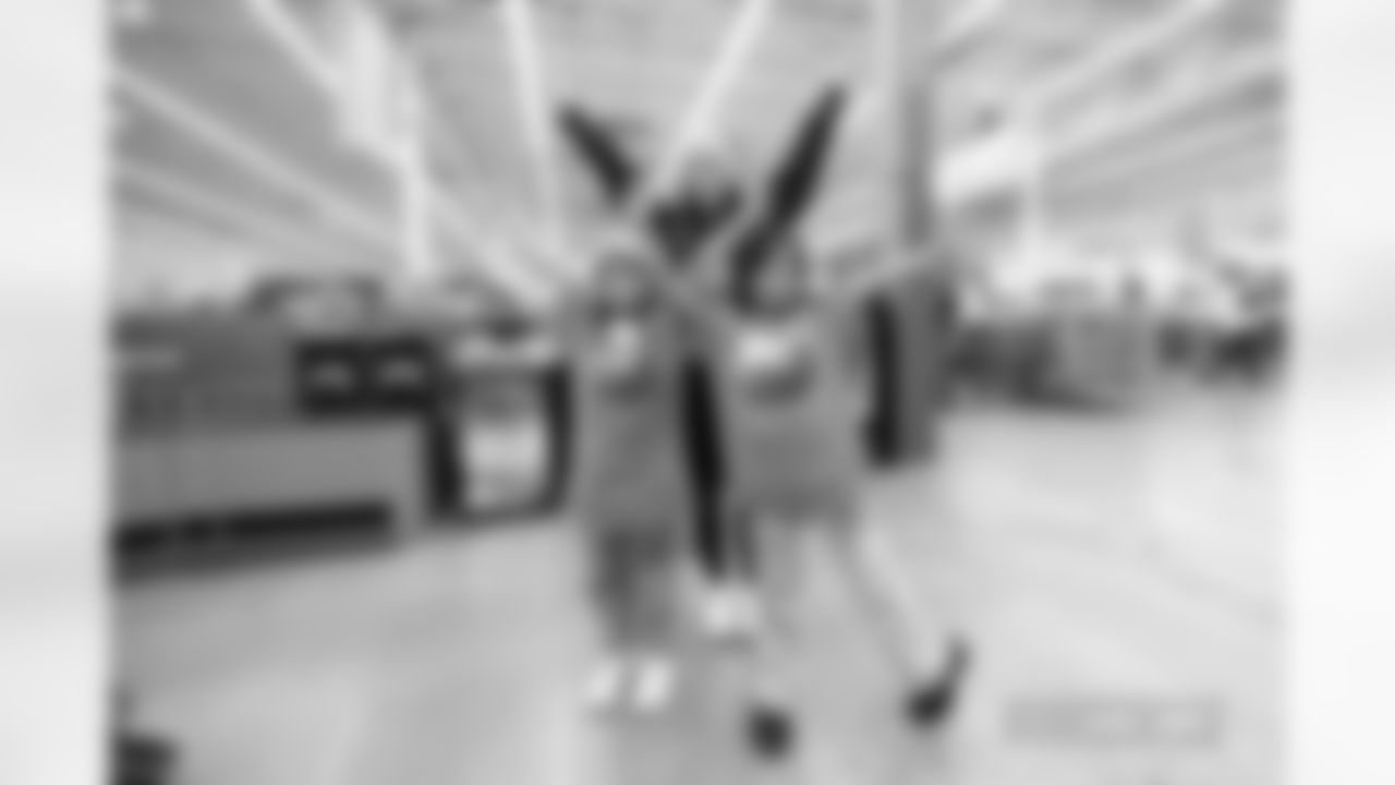 Children from the Boys & Girls Club participate in a Shop with a Jock shopping spree with Broncos players, alumni and cheerleader alumni in Aurora, Colorado on December 15, 2025. Photo by Ben Swanson / Denver Broncos