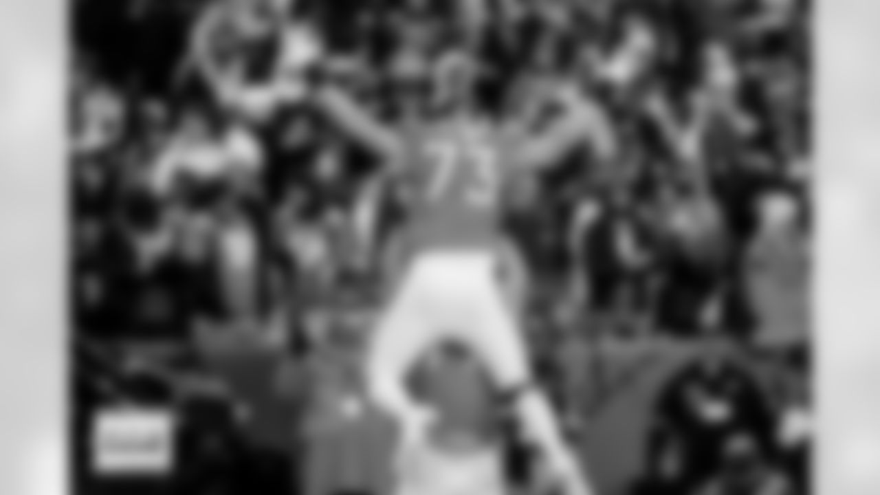 Denver Broncos guard Quinn Meinerz (77) lifts up offensive tackle Frank Crum (73) to celebrate Crum's touchdown reception during the Broncos' Divisional Round playoff game against the Buffalo Bills at Empower Field at Mile High in Denver, Colorado on January 17, 2026. Photo by Ben Swanson / Denver Broncos