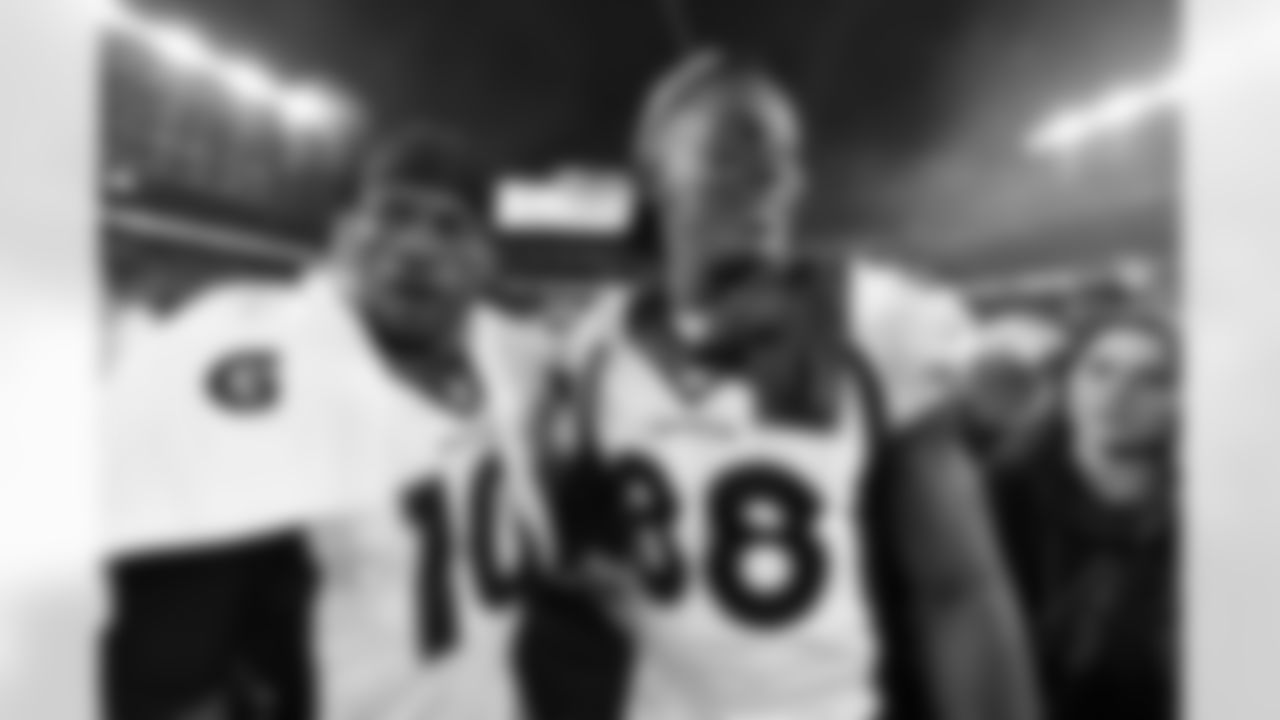 Emmanuel Sanders and Demaryius Thomas during postgame after Denver defeated the Carolina Panthers 24-10 in the NFL Super Bowl 50 at Santa Clara, Calif. February 7, 2016 (Photo by Eric Lars Bakke/ Denver Broncos)