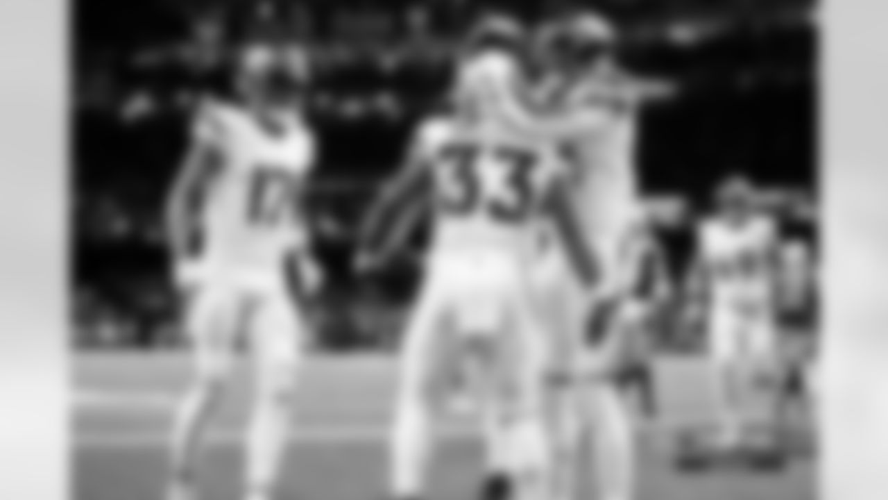 Javonte Williams celebrates with Courtland Sutton after a touchdown run during the Broncos' Week 7 game against the New Orleans Saints at Caesars Superdome in New Orleans, Louisiana on October 17, 2024. Photo by Gabriel Christus / Denver Broncos
