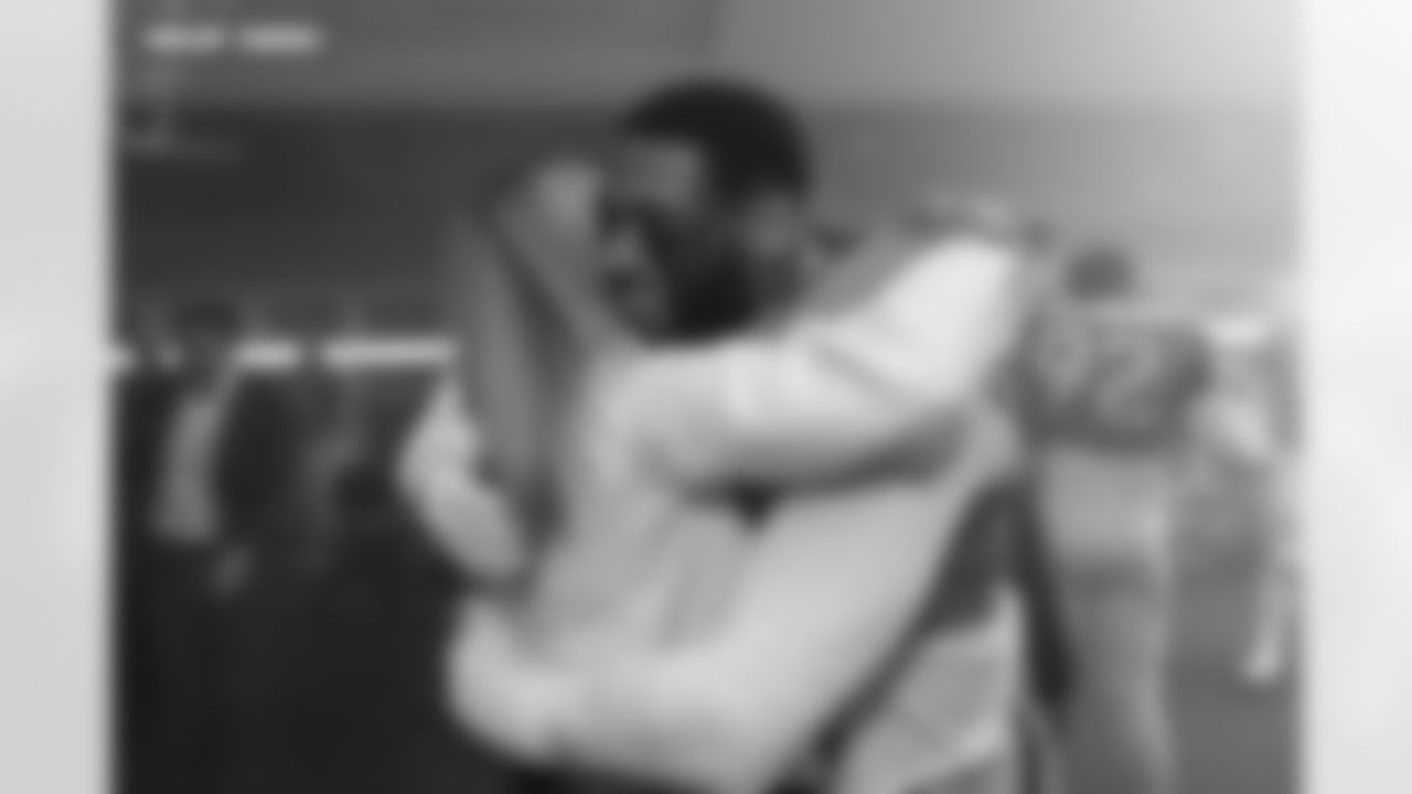 Jonathon Cooper and Carrie Walton Penner during the Broncos' Divisional Round playoff game against the Buffalo Bills at Empower Field at Mile High in Denver, Colorado on January 17, 2026. Photo by Gabriel Christus / Denver Broncos