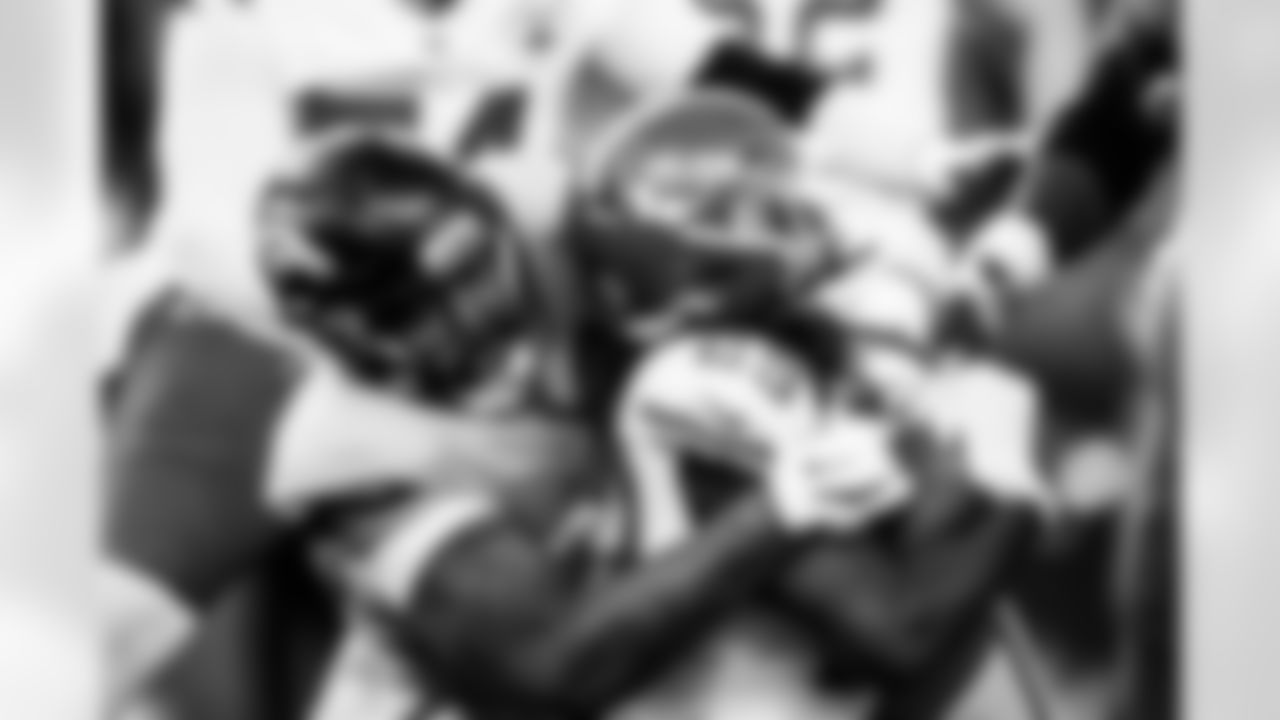 Denver Broncos defensive end Eyioma Uwazurike (96) tackles Kansas City Chiefs running back Kareem Hunt (29) during the Broncos' Week 11 game against the Kansas City Chiefs at Empower Field at Mile High in Denver, Colorado on November 16, 2025. Photo by Ben Swanson / Denver Broncos