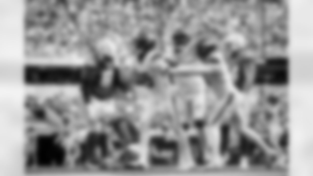 Denver Broncos linebacker Nik Bonitto (15) celebrates with defensive end Eyioma Uwazurike (96) and linebacker Jonathon Cooper (0) after a sack during the Broncos' Week 3 game against the Los Angeles Chargers at SoFi Stadium in Inglewood, California on September 21, 2025. Photo by Ben Swanson / Denver Broncos