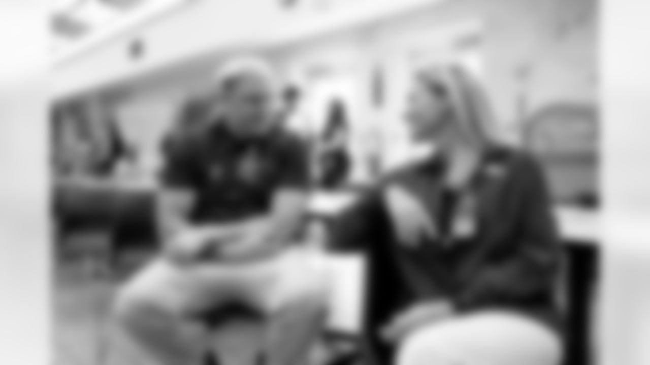 Garett Bolles talks with Carrie Walton Penner during a visit to the Arkansas Valley Correctional Facility in Ordway, Colorado on October 14, 2025. In partnership with the Vera Institute of Justice, the Denver Broncos Foundation toured ChangeMakers Village (a Restoring Promise Unit).Photo by Gabriel Christus / Denver Broncos