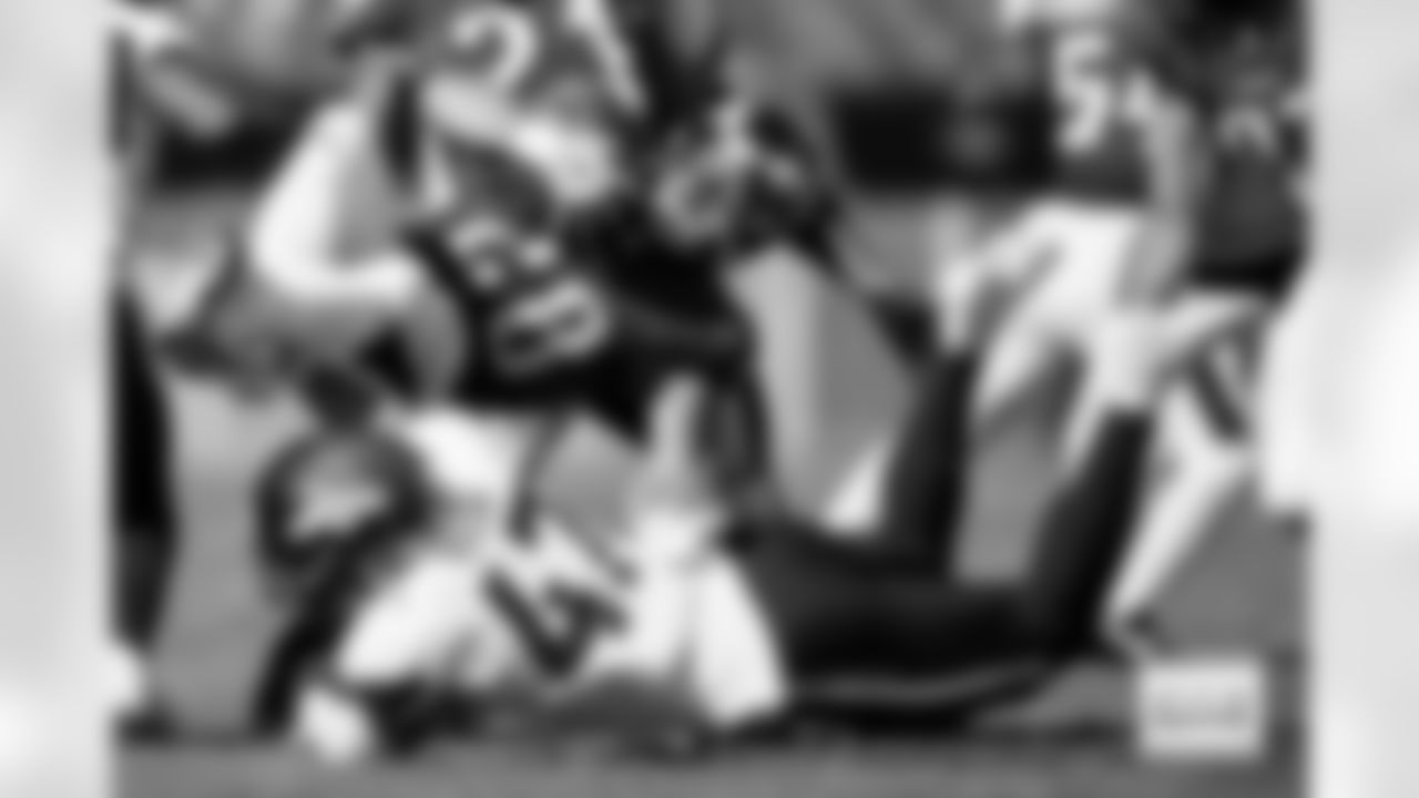 Denver Broncos linebacker Karene Reid (47) tackles Philadelphia Eagles running back Will Shipley (28) during the Broncos' Week 5 game against the Philadelphia Eagles at Lincoln Financial Field in Philadelphia, Pennsylvania on October 5, 2025. Photo by Ben Swanson / Denver Broncos