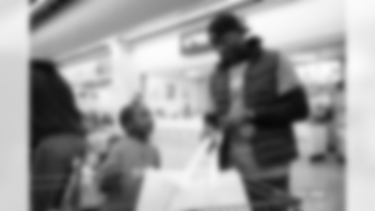 Children from the Boys & Girls Club participate in a Shop with a Jock shopping spree with Broncos players, alumni and cheerleader alumni in Aurora, Colorado on December 15, 2025. Photo by Ben Swanson / Denver Broncos