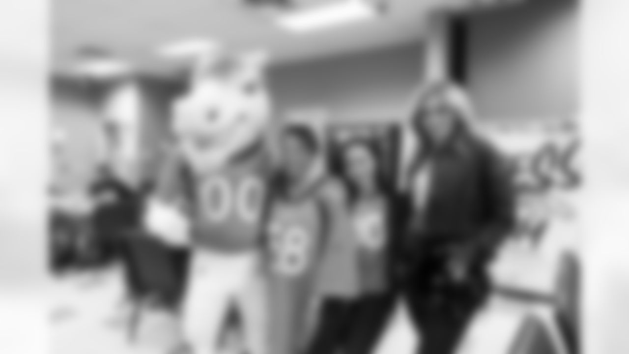 Miles the Mascot rode an Aurora Public Schools bus to pick up kids and accompany them to school as part of Random Acts of Kindness week in Aurora, Colorado on February 12, 2024. Photo by Gabriel Christus / Denver Broncos