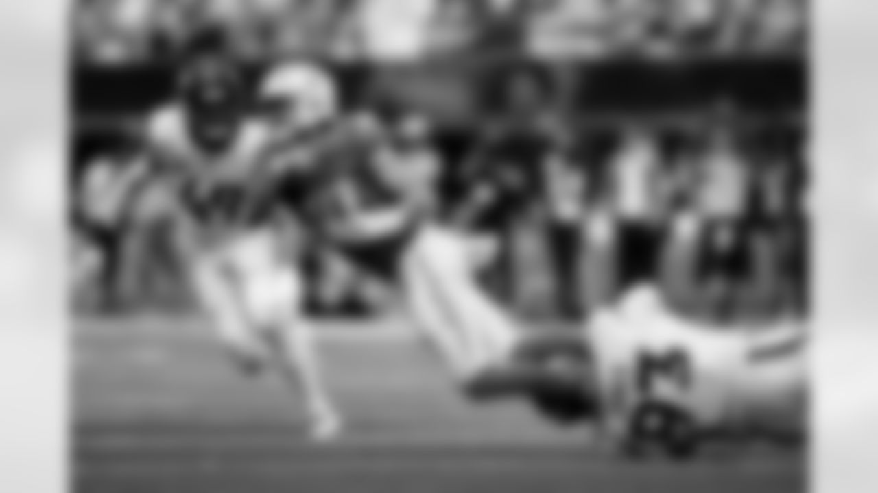 Denver Broncos defensive tackle D.J. Jones (93) sacks Los Angeles Chargers quarterback Justin Herbert (10) during the Broncos' Week 3 game against the Los Angeles Chargers at SoFi Stadium in Inglewood, California on September 21, 2025. Photo by Ben Swanson / Denver Broncos