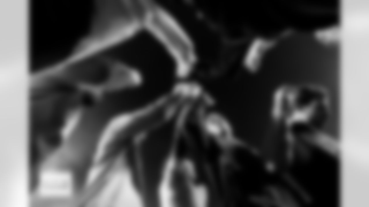 Denver Broncos quarterback Bo Nix and the wide receivers say a prayer in a huddle before the Broncos' Week 17 game against the Kansas City Chiefs at GEHA Field at Arrowhead Stadium in Kansas City, Missouri on December 25, 2025. Photo by Gabriel Christus / Denver Broncos