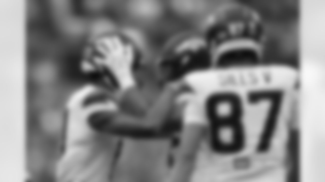 Devaughn Vele and Lucas Krull react during the Broncos' Preseason Week 3 game against the Arizona Cardinals at Empower Field At Mile High on August 25, 2024 in Denver, Colorado. (Photo by Gabriel Christus/Denver Broncos)