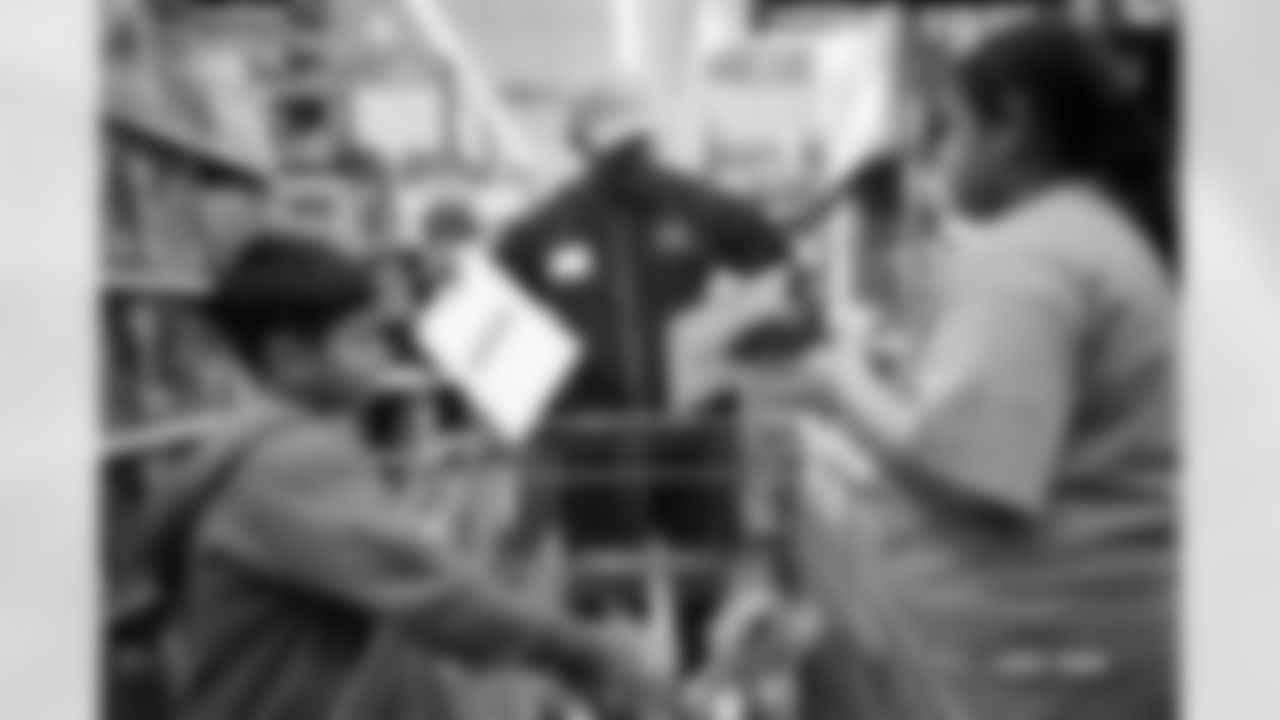 Children from the Boys & Girls Club participate in a Shop with a Jock shopping spree with Broncos players, alumni and cheerleader alumni in Aurora, Colorado on December 15, 2025. Photo by Ben Swanson / Denver Broncos