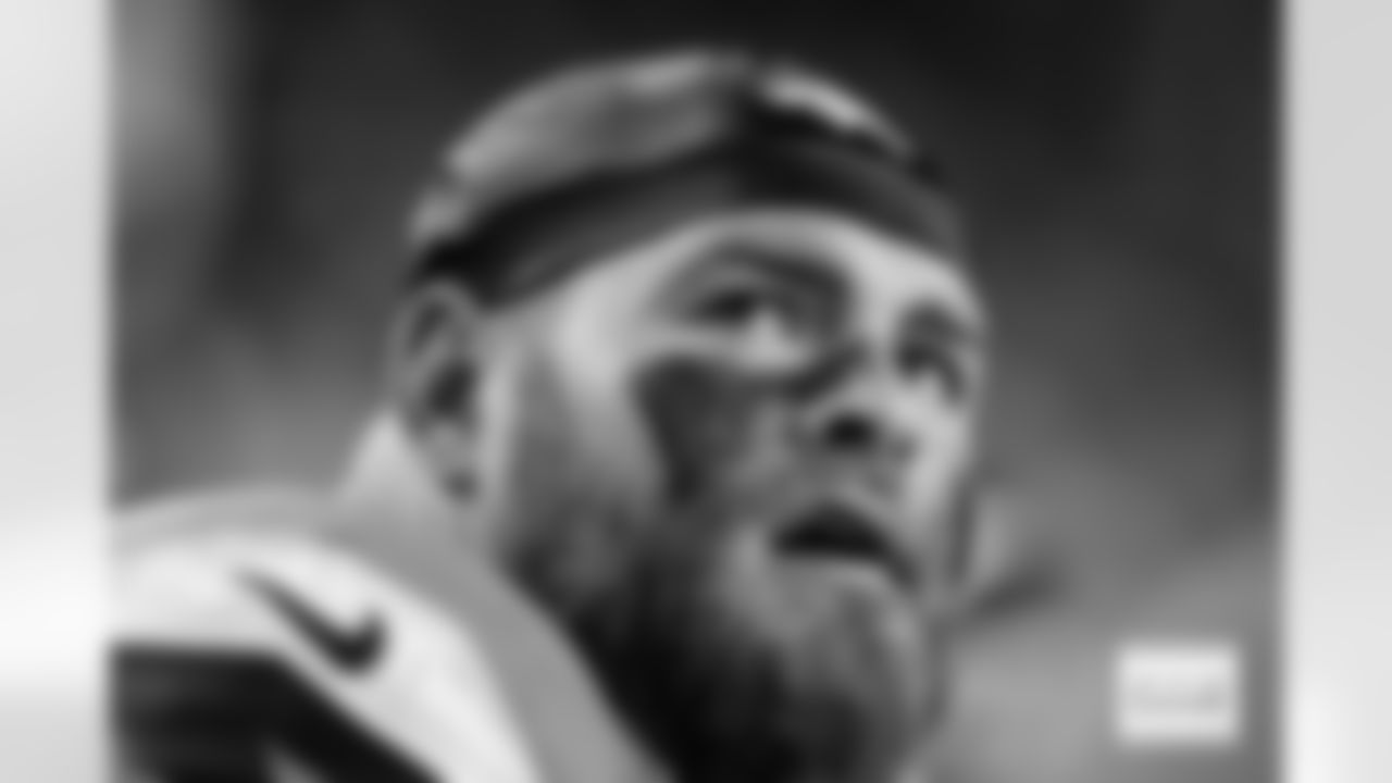 Denver Broncos guard Quinn Meinerz (77) looks on from the sideline during the Broncos' Week 16 game against the Jacksonville Jaguars at Empower Field at Mile High in Denver, Colorado on December 21, 2025. Photo by Ben Swanson / Denver Broncos