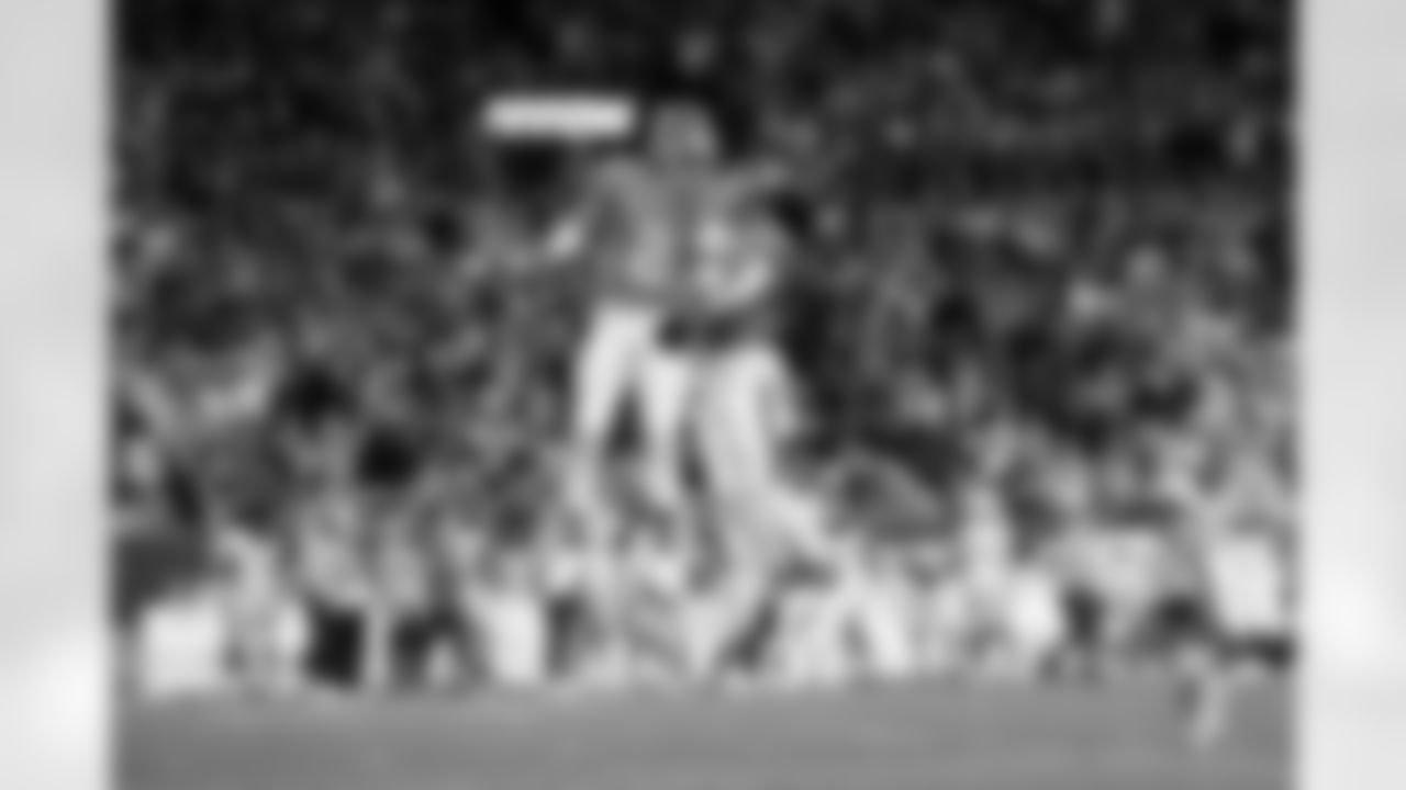 Denver Broncos cornerback Pat Surtain II (2) celebrates with safety Talanoa Hufanga (9) during the Broncos' Week 18 game against the Los Angeles Chargers at Empower Field at Mile High in Denver, Colorado on January 4, 2026. Photo by Ben Swanson / Denver Broncos