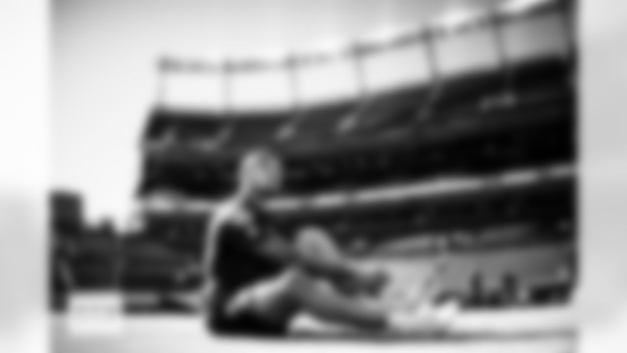 Evan Engram ties his shoes before the Broncos' Week 11 game against the Kansas City Chiefs at Empower Field at Mile High in Denver, Colorado on November 16, 2025. Photo by Ben Swanson / Denver Broncos