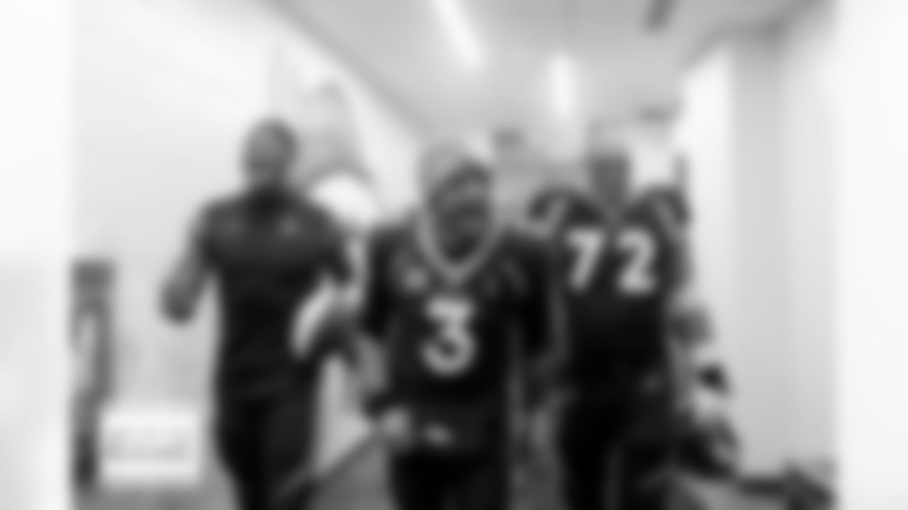 Denver Broncos wide receiver Courtland Sutton (14), quarterback Russell Wilson (3) and offensive tackle Garett Bolles (72) celebrate while waling into the locker room after the Broncos' Week 11 game against the Minnesota Vikings at Empower Field at Mile High in Denver, Colorado on November 19, 2023. Photo by Gabriel Christus / Denver Broncos