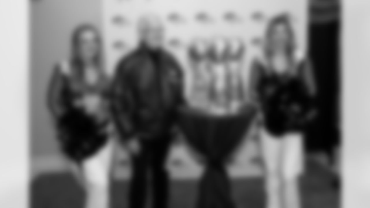 A fan poses with DBC Vika and DBC Kaitlyn at the movie premiere for the Netflix documentary "Elway" at the Ellie Caulkins Opera House in Denver, Colorado on November 8, 2025. Photo by Ben Swanson / Denver Broncos