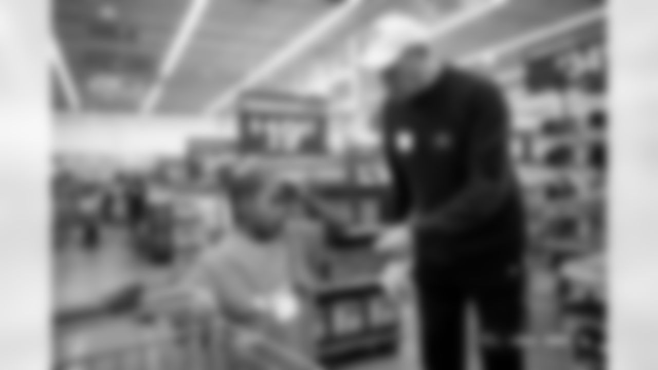 Children from the Boys & Girls Club participate in a Shop with a Jock shopping spree with Broncos players, alumni and cheerleader alumni in Aurora, Colorado on December 15, 2025. Photo by Ben Swanson / Denver Broncos