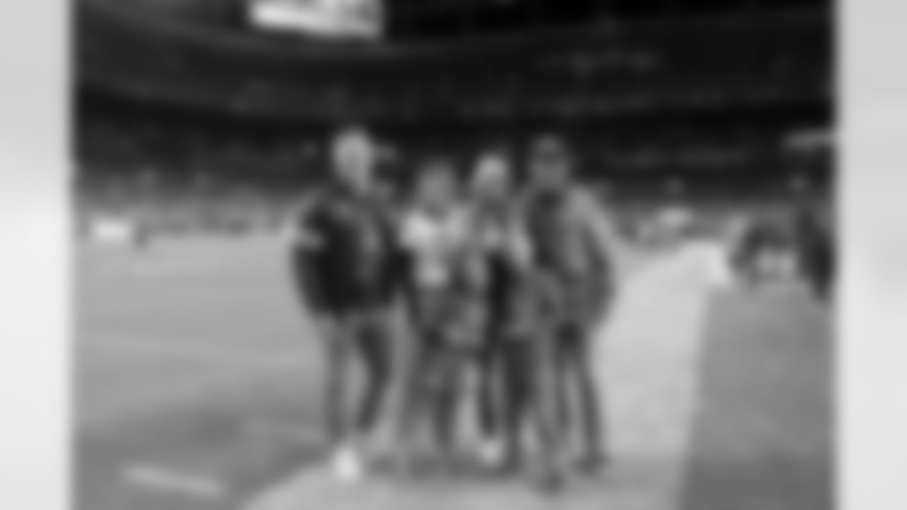 Scott Porter and his family before the Broncos' Week 11 game against the Minnesota Vikings at Empower Field at Mile High in Denver, Colorado on November 19, 2023. Photo by Gabriel Christus / Denver Broncos