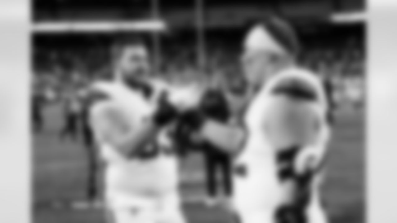 Alex Palczewski and Garett Bolles after the Broncos' Week 17 game against the Kansas City Chiefs at GEHA Field at Arrowhead Stadium in Kansas City, Missouri on December 25, 2025. Photo by Ben Swanson / Denver Broncos