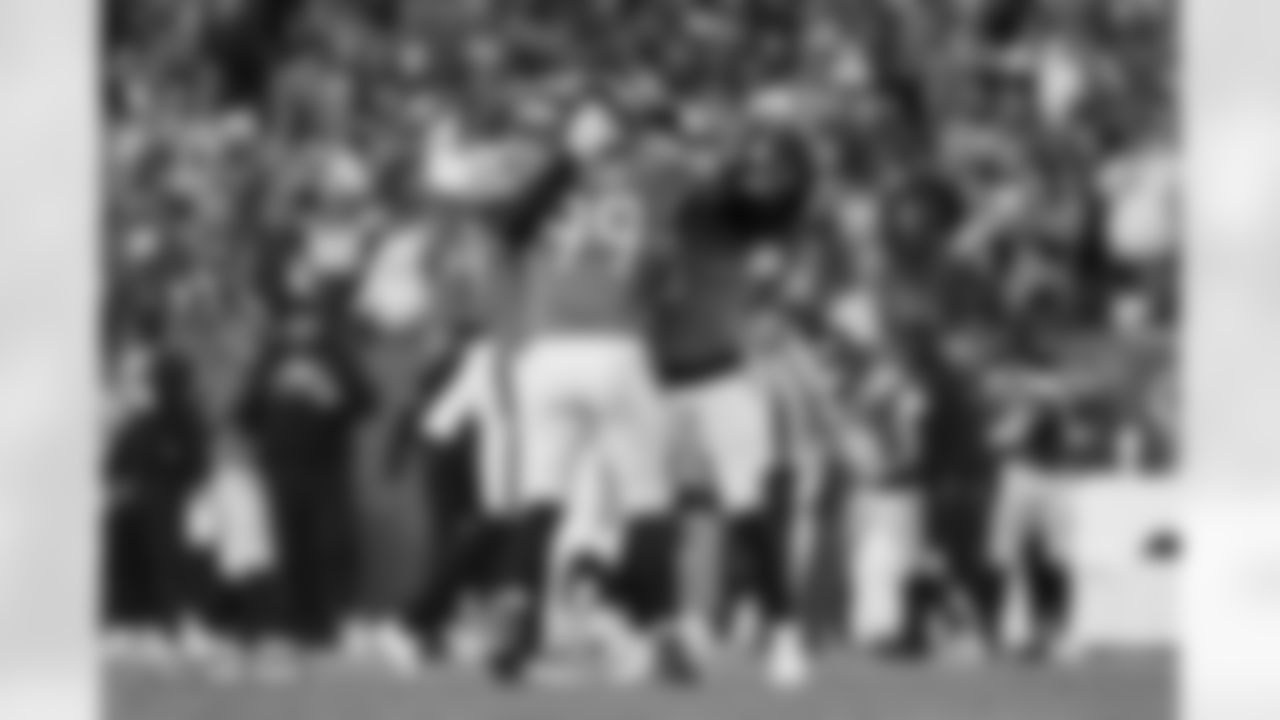 Alex Singleton, Zach Allen and Jonathon Cooper during the Broncos' Week 15 game against the Green Bay Packers at Empower Field at Mile High in Denver, Colorado on December 14, 2025. Photo by Ben Swanson / Denver Broncos