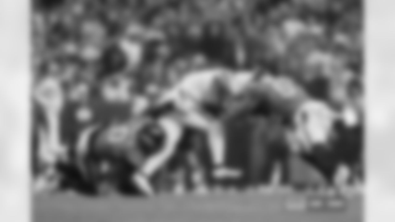 Jonathon Cooper (0) and Dre Greenlaw (57) during the Broncos' Week 15 game against the Green Bay Packers at Empower Field at Mile High in Denver, Colorado on December 14, 2025. Photo by Gabriel Christus / Denver Broncos