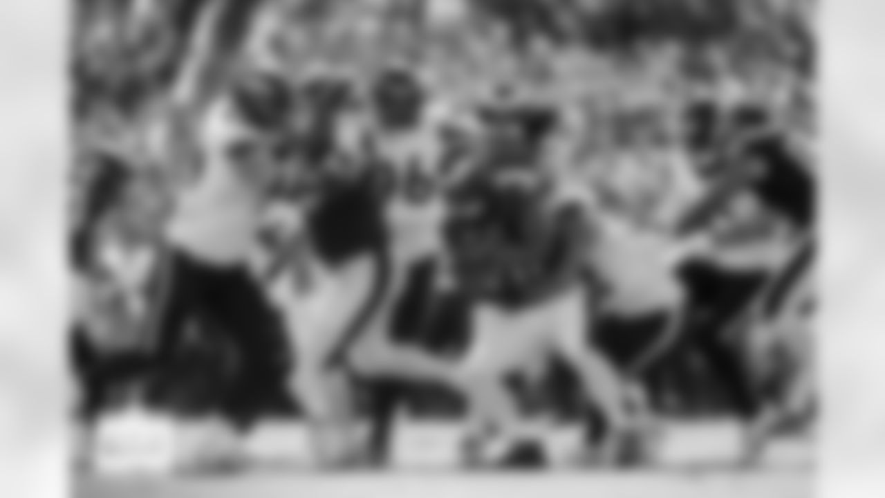 Denver Broncos linebacker Jonah Elliss (52) tackles Philadelphia Eagles running back Saquon Barkley (26) during the Broncos' Week 5 game against the Philadelphia Eagles at Lincoln Financial Field in Philadelphia, Pennsylvania on October 5, 2025. Photo by Gabriel Christus / Denver Broncos