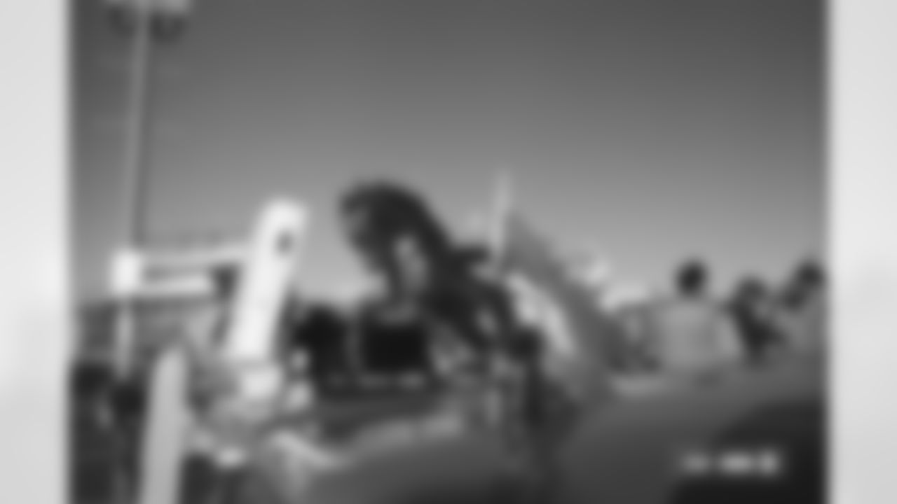 A hood ornament on a Denver Broncos fan's car photographed on film during the Broncos' Week 10 game against the Las Vegas Raiders at Empower Field at Mile High in Denver, Colorado on November 7, 2025. Photo by Ben Swanson / Denver Broncos