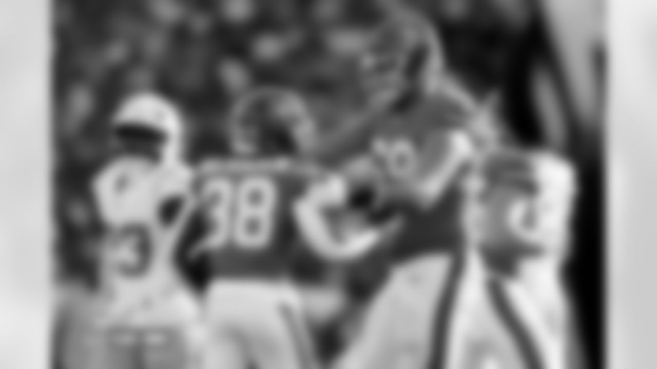 Mike McGlinchey and Jaleel McLaughlin (38) during the Broncos' Week 18 game against the Los Angeles Chargers at Empower Field at Mile High in Denver, Colorado on January 4, 2026. Photo by Gabriel Christus / Denver Broncos