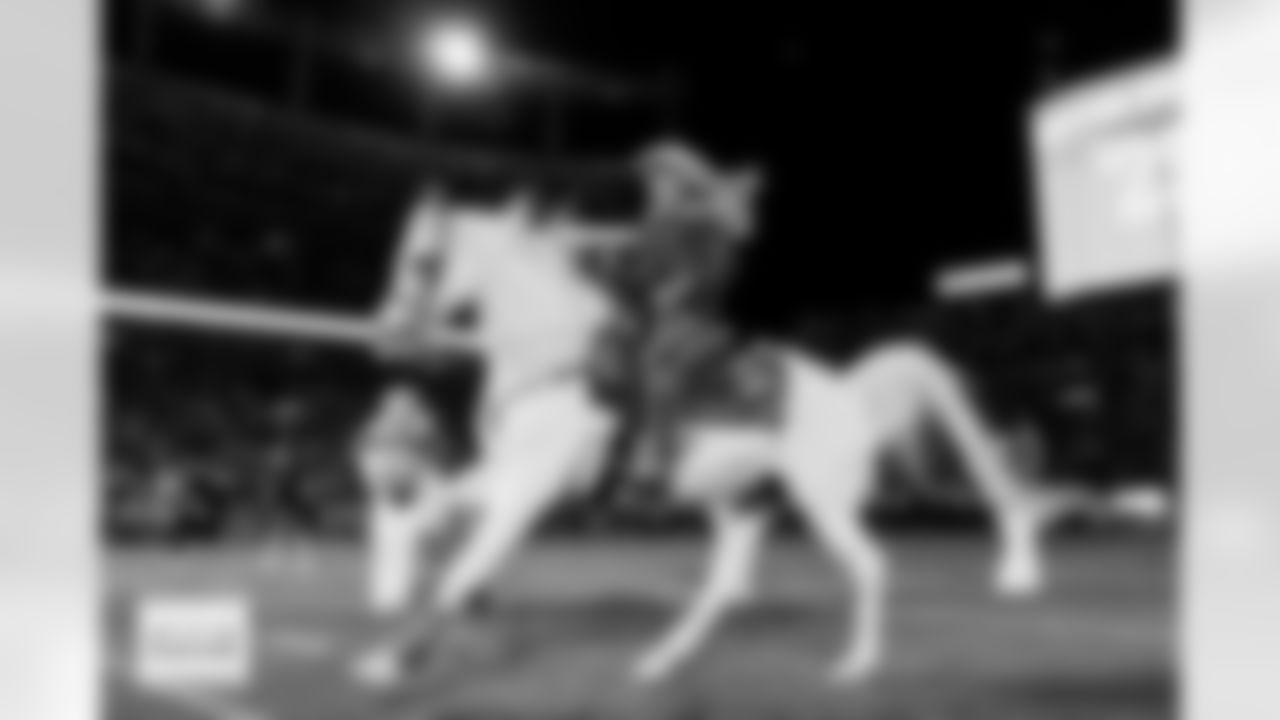 Ann Judge rides Denver Broncos mascot "Thunder" onto the field before the Broncos' Week 10 game against the Las Vegas Raiders at Empower Field at Mile High in Denver, Colorado on November 6, 2025. Photo by Gavin Liddell / Denver Broncos