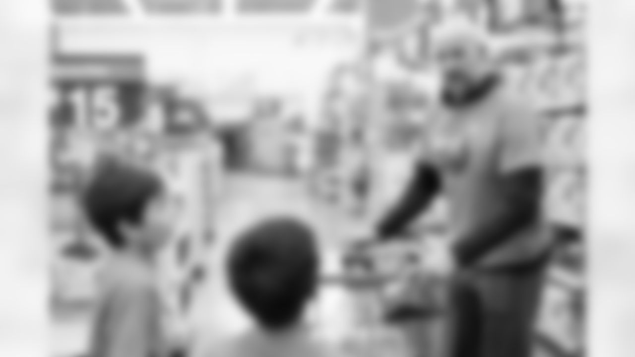 Children from the Denver Broncos Boys & Girls Club participate in a Shop with a Jock shopping spree with Broncos players, alumni and cheerleader alumni in Aurora, Colorado on December 2, 2025. Photo by Ben Swanson / Denver Broncos