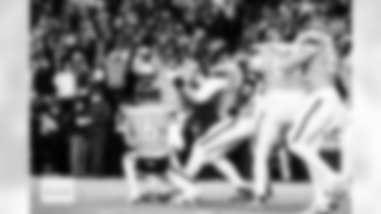 Denver Broncos placekicker Wil Lutz (3) celebrates the game-winning field goal with punter Jeremy Crawshaw (16) and offensive tackle Mike McGlinchey (69) during the Broncos' Divisional Round playoff game against the Buffalo Bills at Empower Field at Mile High in Denver, Colorado on January 17, 2026. Photo by Gabriel Christus / Denver Broncos