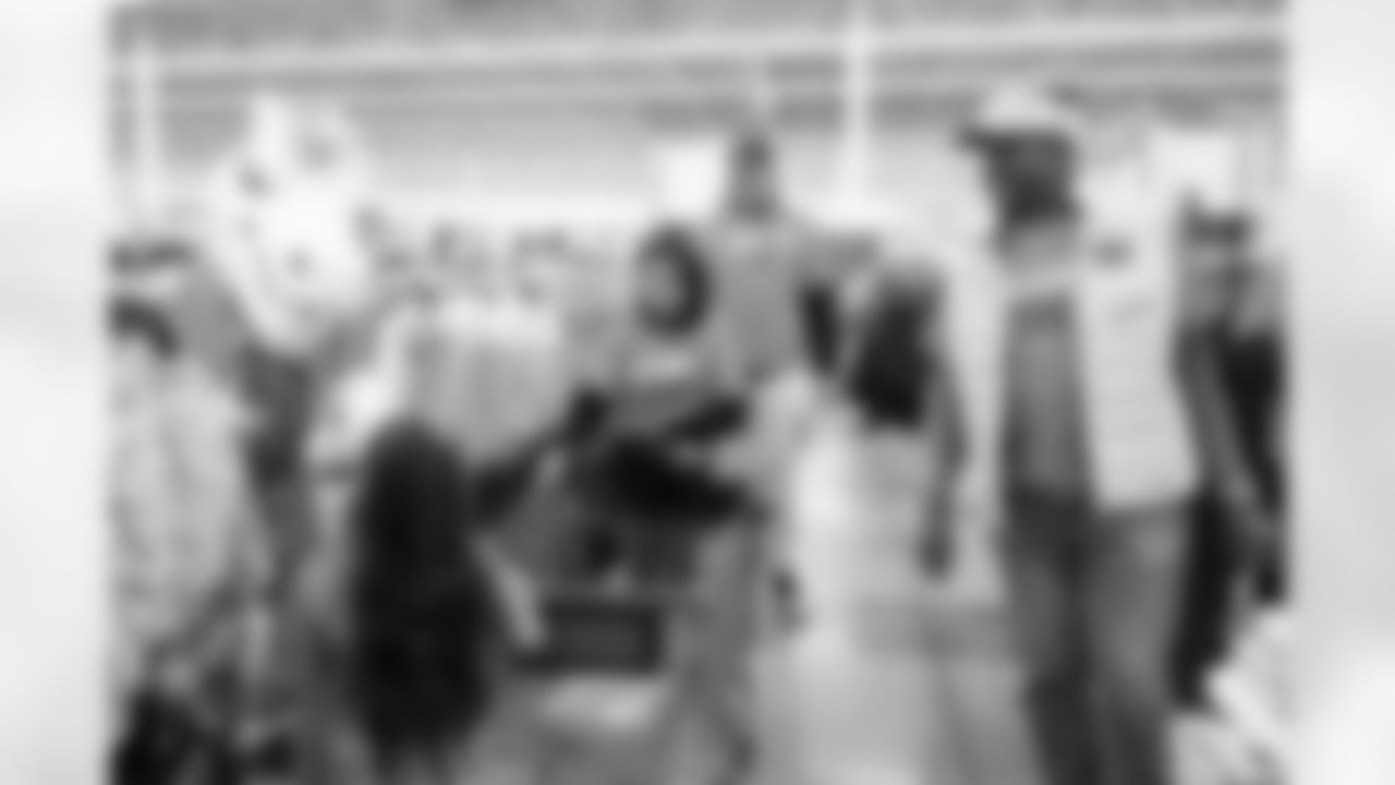 Children from the Denver Broncos Boys & Girls Club participate in a Shop with a Jock shopping spree with Broncos players, alumni and cheerleader alumni in Aurora, Colorado on December 2, 2025. Photo by Ben Swanson / Denver Broncos