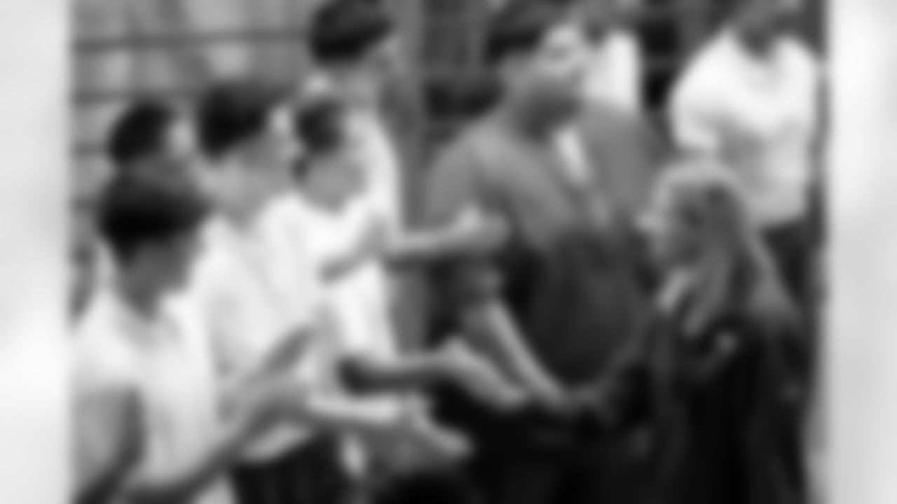 Carrie Walton Penner greets ChangeMakers during a visit to the Arkansas Valley Correctional Facility in Ordway, Colorado on October 14, 2025. In partnership with the Vera Institute of Justice, the Denver Broncos Foundation toured ChangeMakers Village (a Restoring Promise Unit).Photo by Gabriel Christus / Denver Broncos